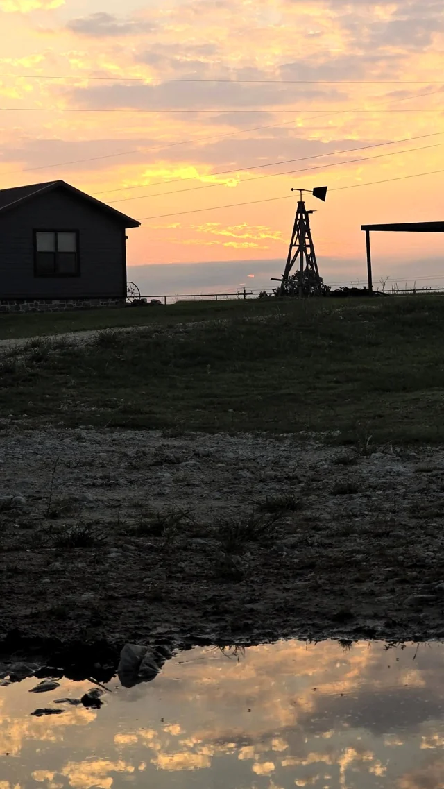 The bunkhouse, and the sky in the puddle
